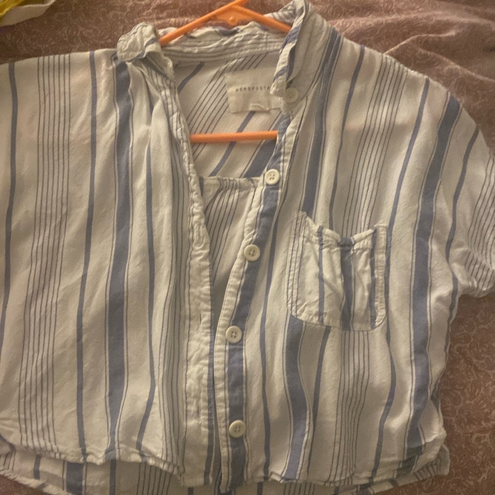 Blue and white crop top with buttons and a pocket